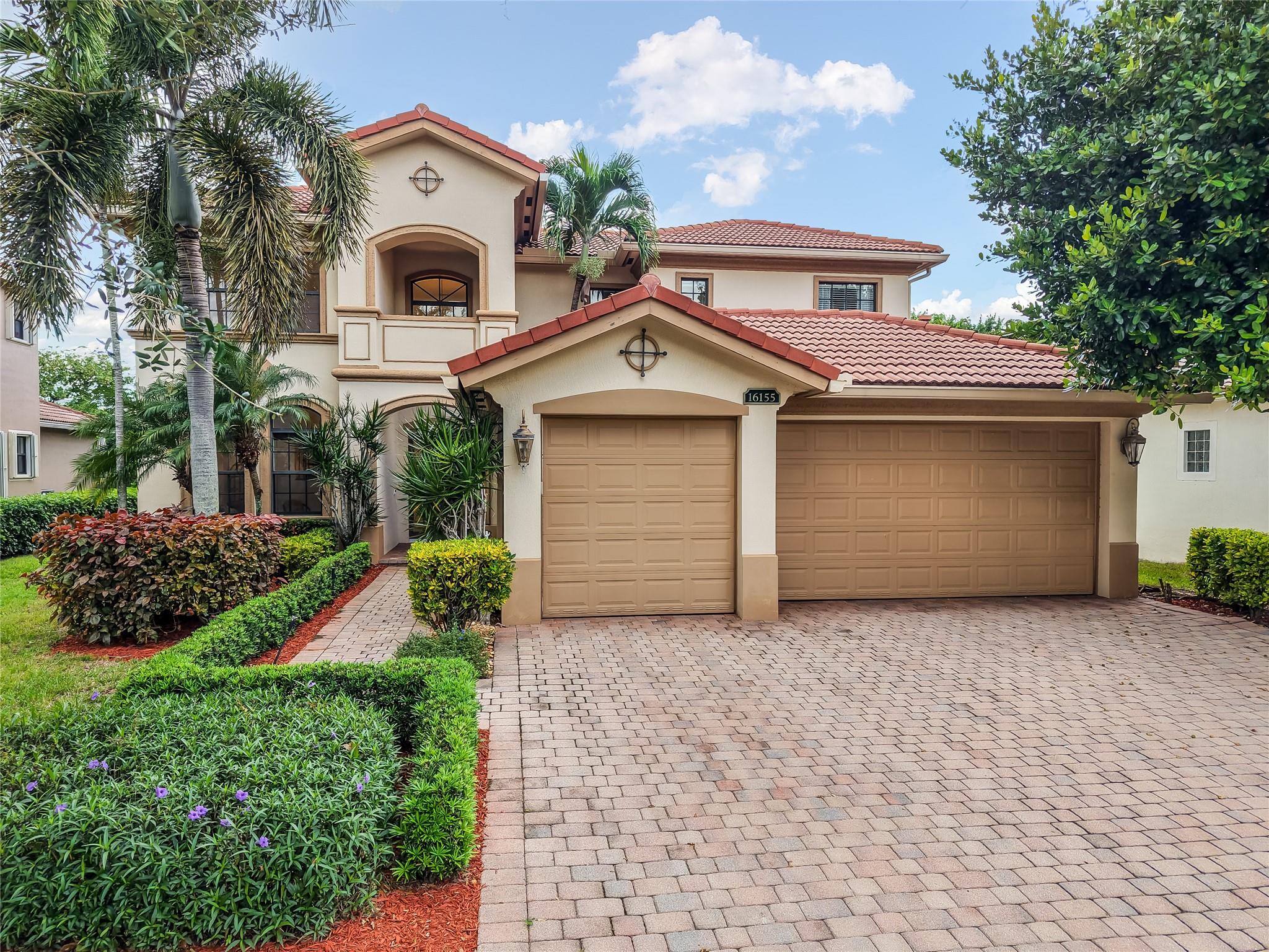Rare 4 bed, 4 bath home in highly desirable Casa Bella community! This spacious residence features a dramatic two-story entry, vaulted and tray ceilings, arched doorways, ceramic tile flooring, and upgraded fixtures and finishes. Gourmet eat-in kitchen with granite countertops, SS appliances, seated center island, and Shaker-style cabinetry. Primary suite with walk-in closet and spa-style bath featuring dual vanities, soaking tub, and separate shower. Enjoy outdoor living on the expansive patio overlooking the private pool and spa. Additional features include a 3 car garage, laundry room with cabinetry and utility sink. 2 A/C Units Replaced 2023 and 2024, water heater 2023, and  impact glass. Casa Bella offers resort-style amenities including a clubhouse, and community pool.