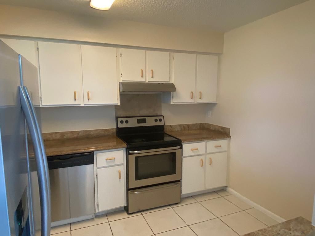 Photo of 4901 Pier Drive, Greenacres, FL 33463 (MLS # B26021061)