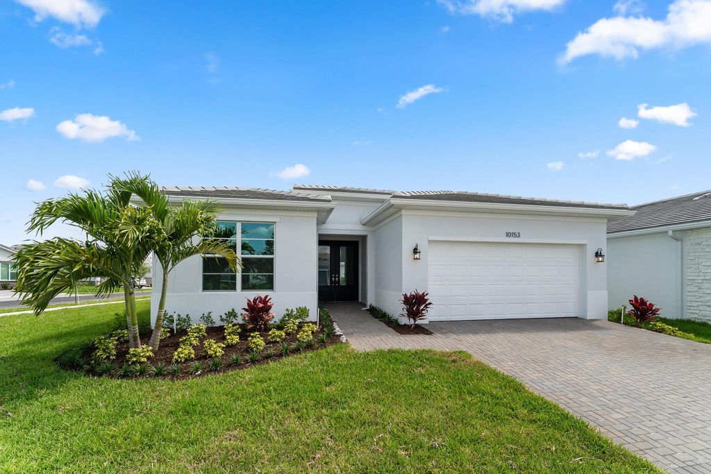 Photo of 10153 SW Carnelian Street, Port Saint Lucie, FL 34987 (MLS # R11087109)