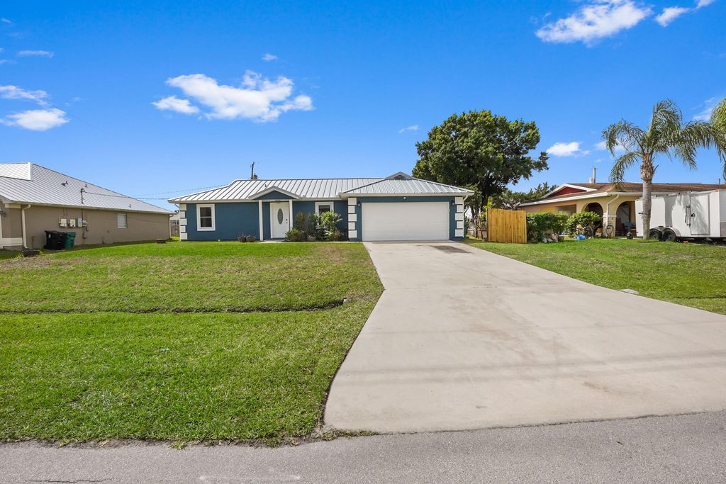 Photo of 2138 SW Janette Avenue, Port Saint Lucie, FL 34953 (MLS # B26015710)