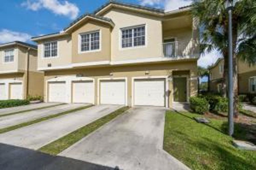 Photo of 3037 Grandiflora Drive Dr, Green Acres, FL 33467 (MLS # R10745157)
