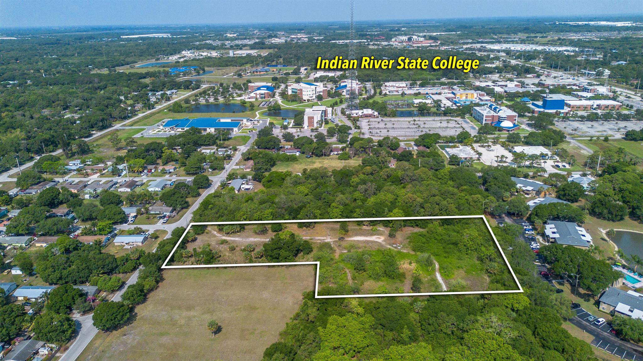 Owner financing is available with 50% down and a 10% interest rate, making this an attractive opportunity! This exceptional 2.42-acre parcel is a rare gem nestled in the highly sought-after neighborhoods of Port St. Lucie and Fort Pierce. Strategically positioned near Indian River State College, Lawnwood Medical Center, and the St. Lucie County Administrative Offices, this lot offers immense potential for innovative residential development that will appeal to discerning million-dollar investors and land developers.Zoned for up to 10 units per acre per the Tax Assessor Zone, with the possibility of expanding to 12 units per acre through bonus density justification, this property presents a lucrative investment opportunity.