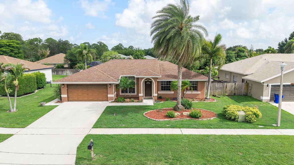 Photo of 112 Laurel Way, Royal Palm Beach, FL 33411 (MLS # B26033846)