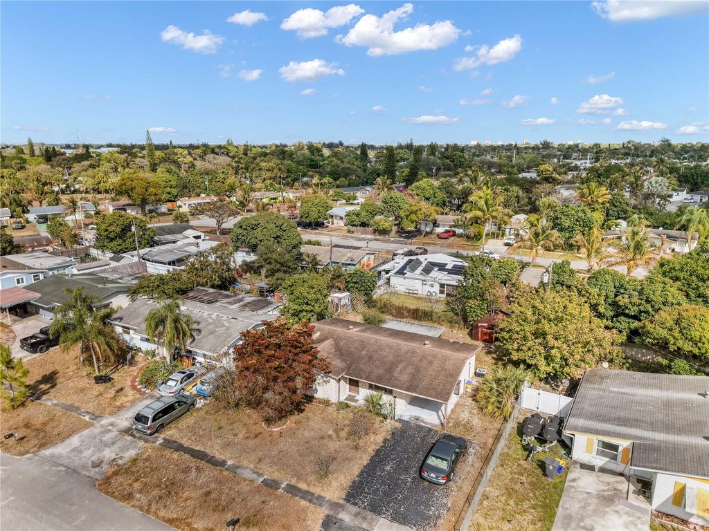 Photo of 1398 Fernlea Drive, West Palm Beach, FL 33417 (MLS # F10551619)