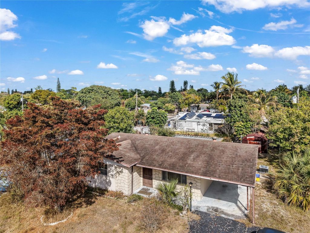 Photo of 1398 Fernlea Drive, West Palm Beach, FL 33417 (MLS # F10551619)