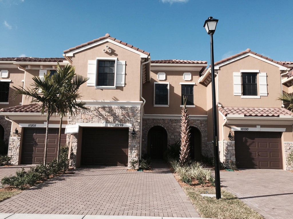 Photo of 10199 WELLINGTON PARC Drive, Wellington, FL 33449 (MLS # B26082590)