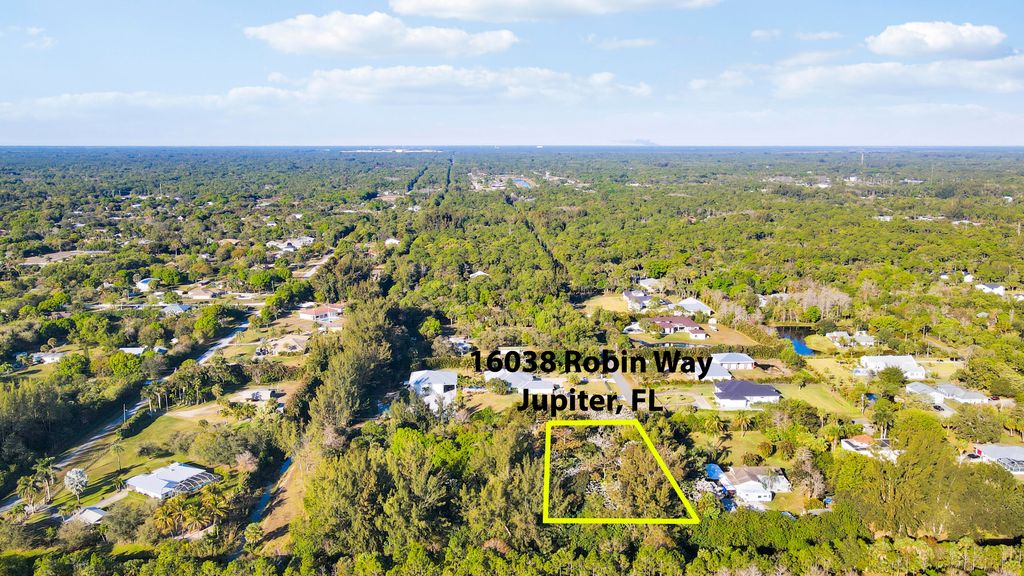 Photo of 16038 Robin Way, Jupiter, FL 33478 (MLS # R11159426)