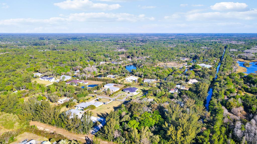 Photo of 16038 Robin Way, Jupiter, FL 33478 (MLS # R11159426)