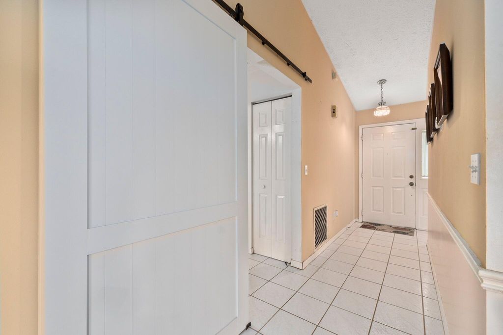 Photo of 739 SE Evergreen Terrace, Port Saint Lucie, FL 34983 (MLS # R11001515)