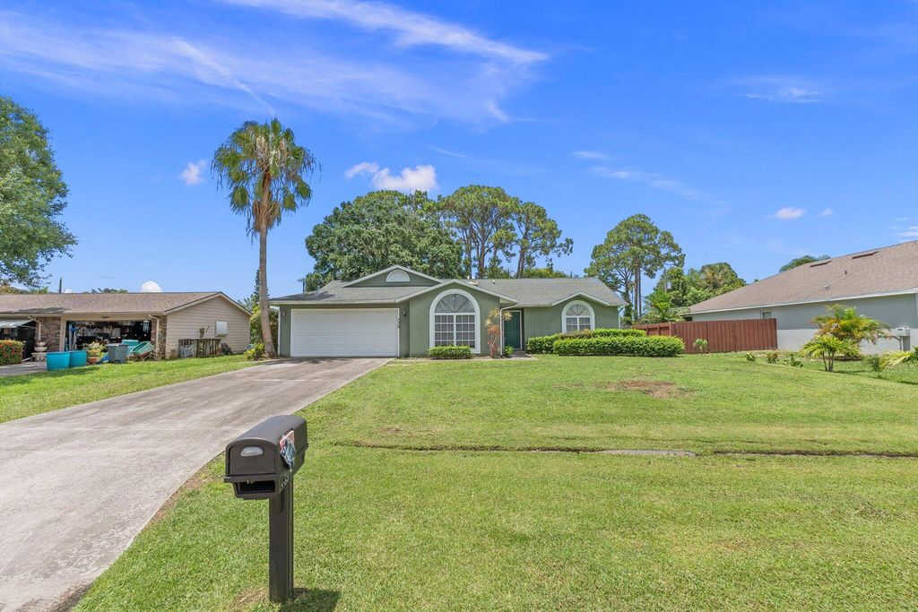 Photo of 739 SE Evergreen Terrace, Port Saint Lucie, FL 34983 (MLS # R11001515)