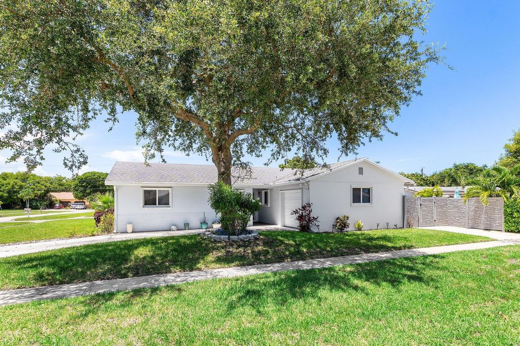 Photo of 401 NE 37th Street, Boca Raton, FL 33431 (MLS # R11110352)