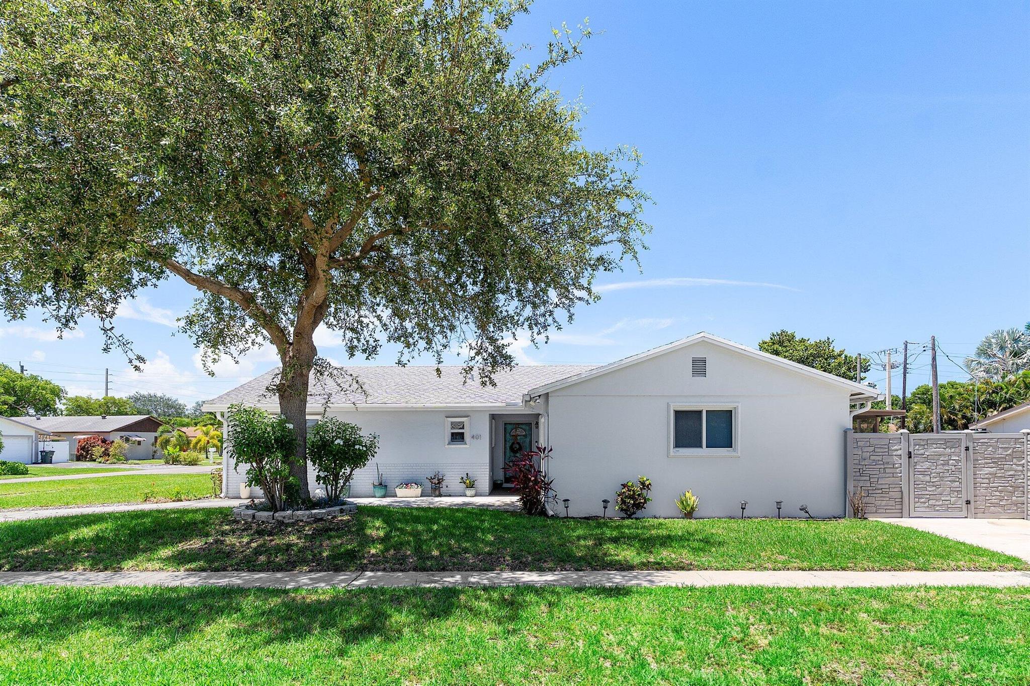 Updated corner lot pool home in a sought after East Boca Raton neighborhood. This home is just minutes from Boca Raton's beautiful beaches. This 3 bedroom 2 bath home features an updated kitchen with stainless steel appliances. Relax in your resort style back yard with a covered patio facing the newer designed salt water pool including a sun shelf. The home comes equipped with a back up generator and impact glass windows. Beautiful upgrades include plantation style shutters and updated bathrooms. All furniture is negotiable as well!