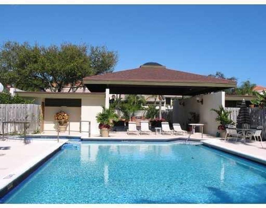 LARGE TWO-LEVEL CORNER T.H. IN LITTLE GEM OF A COMPLEX W/GORGEOUS POOL & CABANA-GREAT RESIDENTIAL STREET! Unit was painted & new carpet done during last tenancy. Unit features 2 Living Rooms, Dining Area, Open Kitchen, Patio, 1/2 bath downstairs-Upstairs: Split Floor plan w/2 Master Bedrooms (large & really oversized), Washer & Dryer, Walk-in closet! East Ft Laud. area 2 miles to Beach, close to LA Fitness, Coral Ridge Mall, Publix, Fresh Market, great Restaurants & Movies. Near great schools!