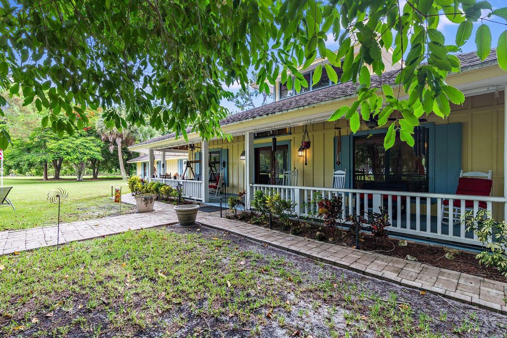 Photo of 14640 Crazy Horse Lane, Palm Beach Gardens, FL 33418 (MLS # R10968086)