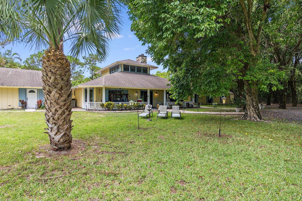 Photo of 14640 Crazy Horse Lane, Palm Beach Gardens, FL 33418 (MLS # R10968086)