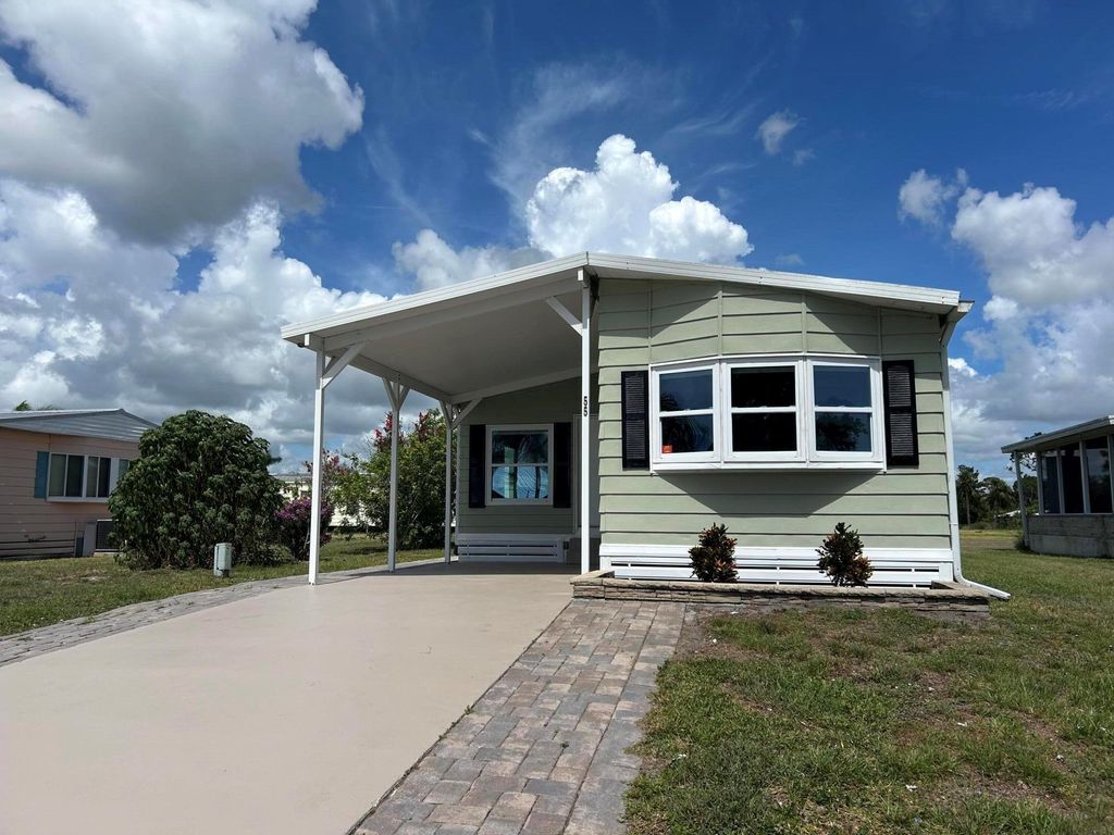 Photo of 55 Vista De Laguna, Fort Pierce, FL 34951 (MLS # R11104839)