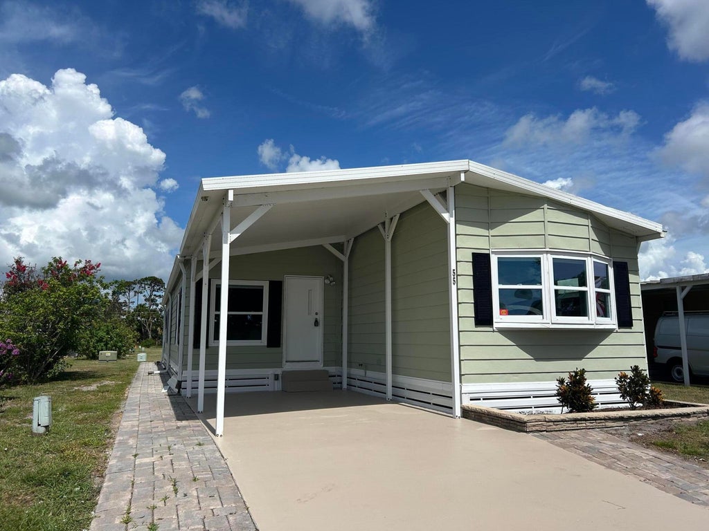 Photo of 55 Vista De Laguna, Fort Pierce, FL 34951 (MLS # R11104839)