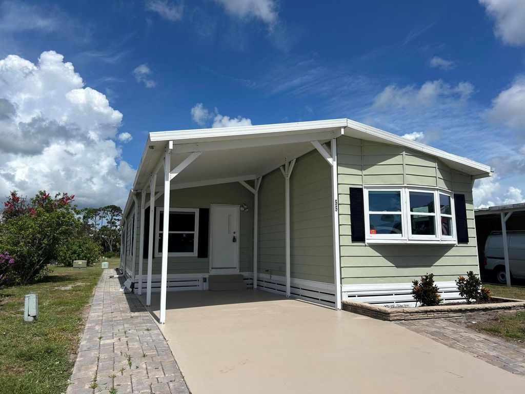 Photo of 55 Vista De Laguna, Fort Pierce, FL 34951 (MLS # R11104839)