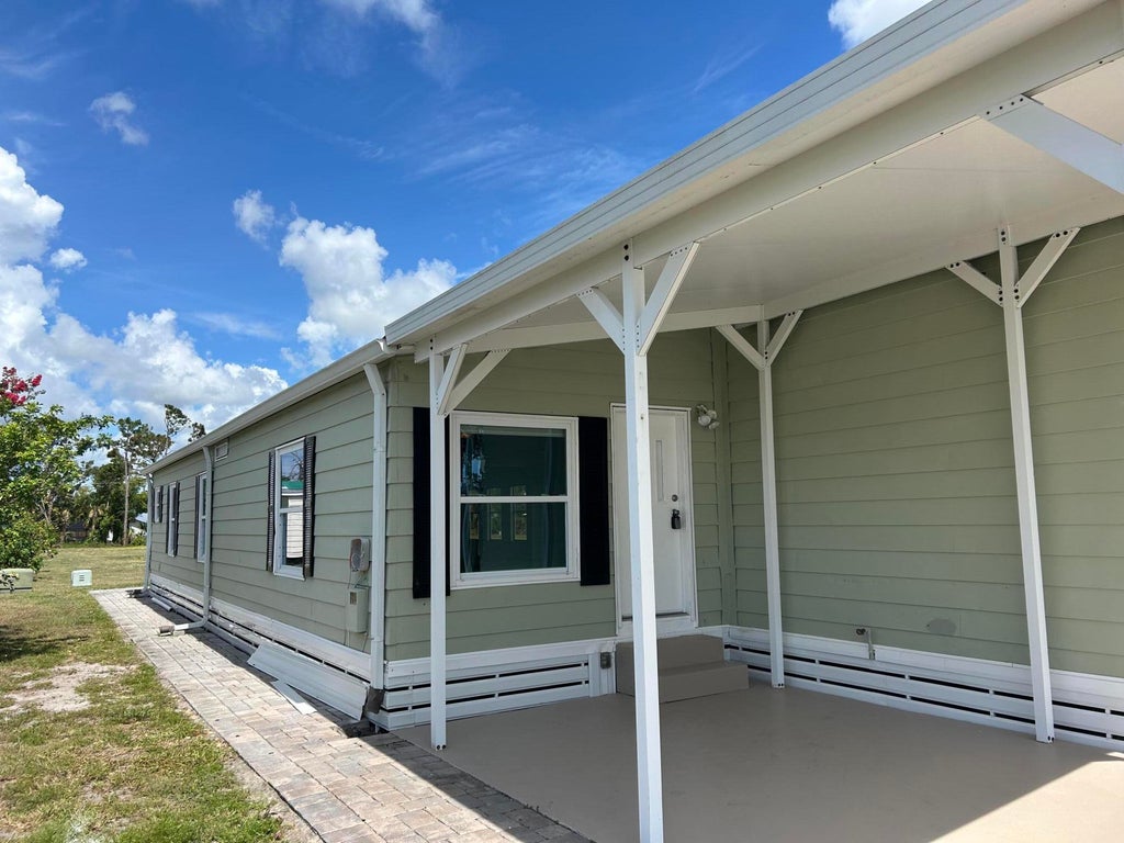 Photo of 55 Vista De Laguna, Fort Pierce, FL 34951 (MLS # R11104839)