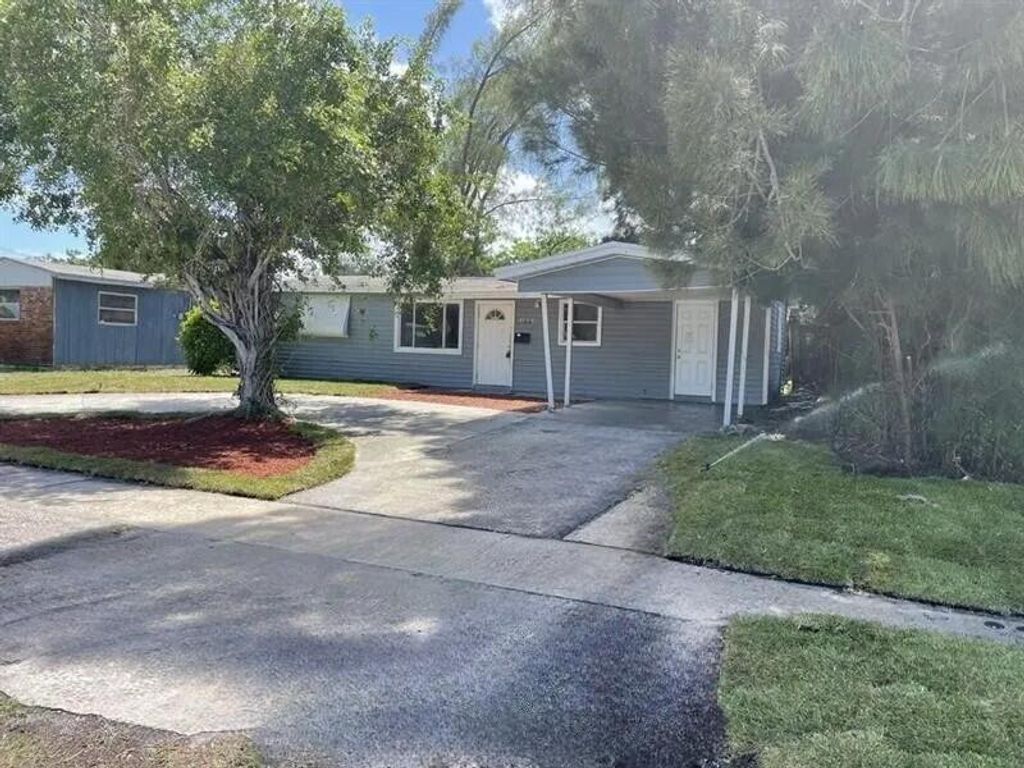Photo of 1601 Avenue H W Avenue W, Riviera Beach, FL 33404 (MLS # R11147555)