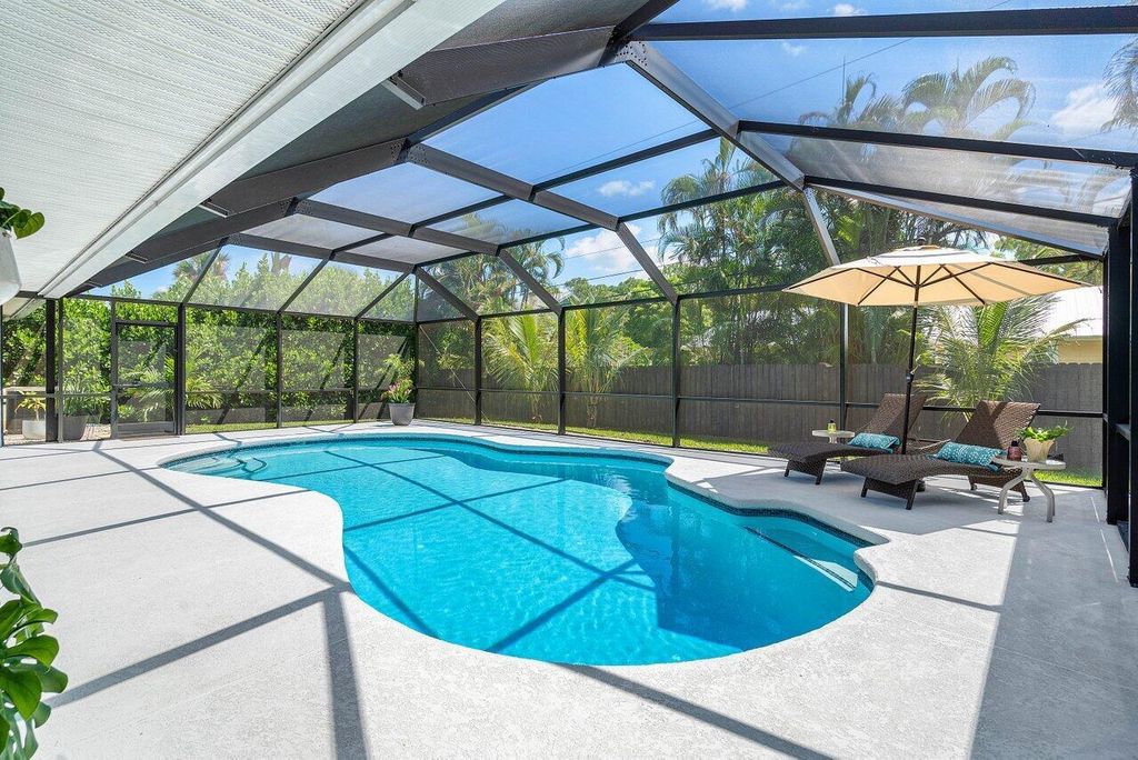 Photo of 3081 SW Grapevine Lane, Palm City, FL 34990 (MLS # R11014013)