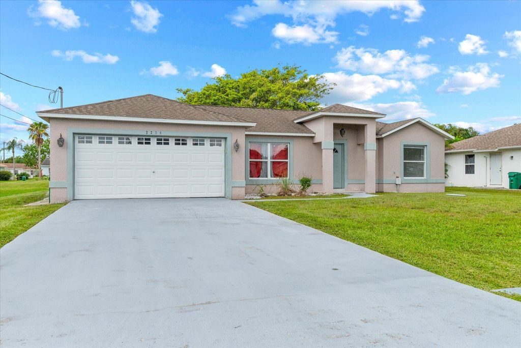 Photo of 2234 SE Friendship Street, Port Saint Lucie, FL 34952 (MLS # R11006555)