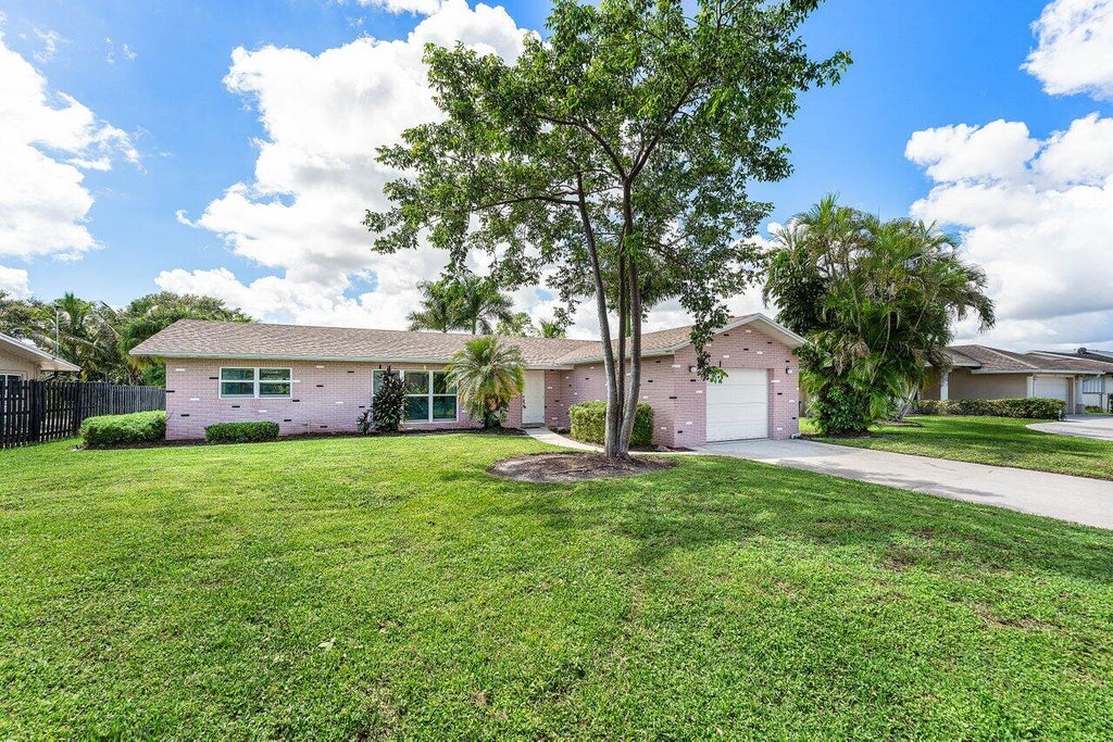 Photo of 128 Sandpiper Avenue, Royal Palm Beach, FL 33411 (MLS # B26080552)