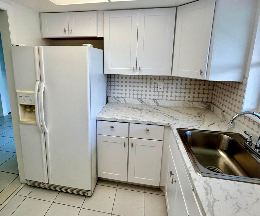 Photo of 2895 CROSLEY Drive W #C, West Palm Beach, FL 33415 (MLS # B26066560)