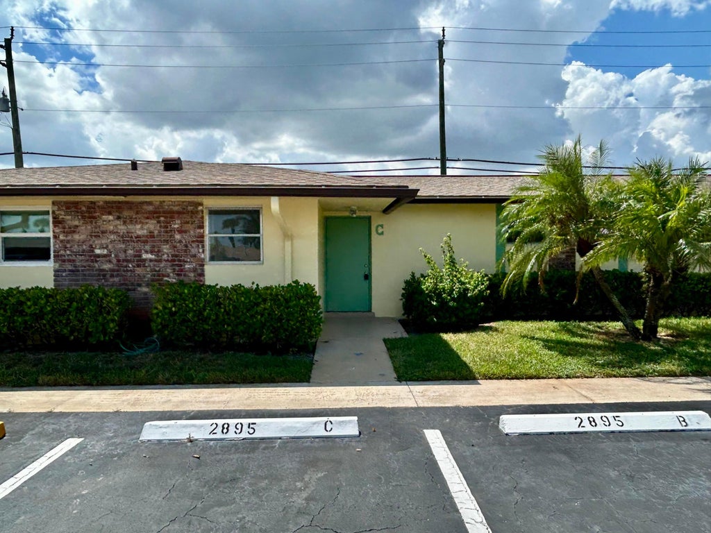 Photo of 2895 CROSLEY Drive W #C, West Palm Beach, FL 33415 (MLS # B26066560)