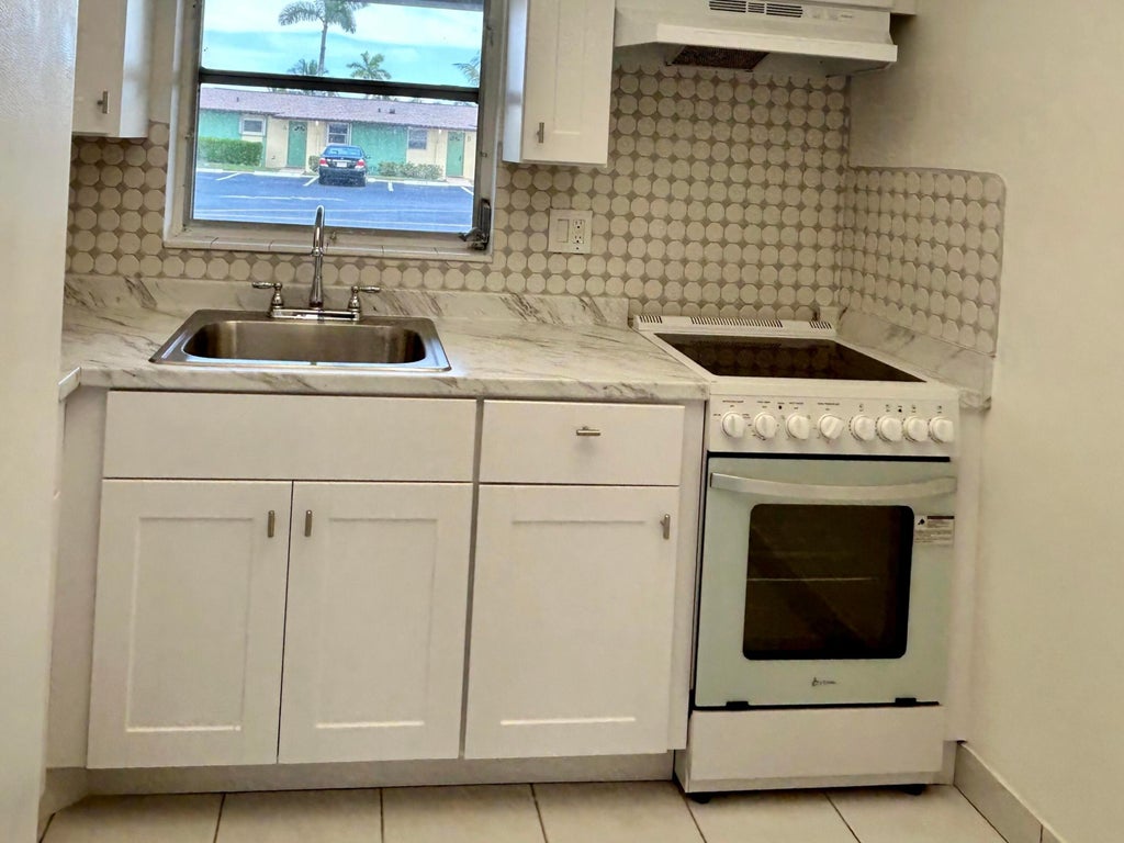 Photo of 2895 CROSLEY Drive W #C, West Palm Beach, FL 33415 (MLS # B26066560)