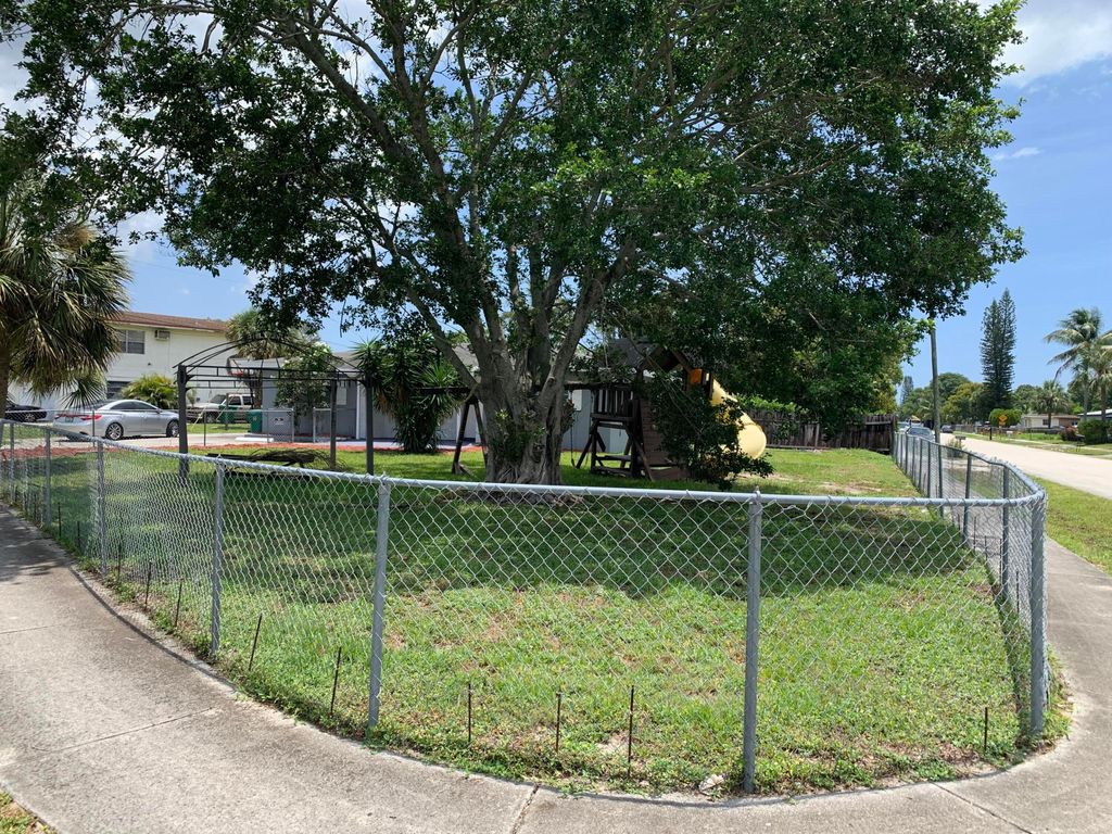 Photo of 240 NW 38th Avenue, Lauderhill, FL 33311 (MLS # B26042648)