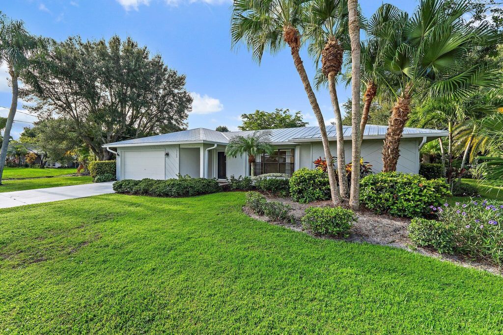 Photo of 2042 SE Pyramid Road, Port Saint Lucie, FL 34952 (MLS # R11129303)