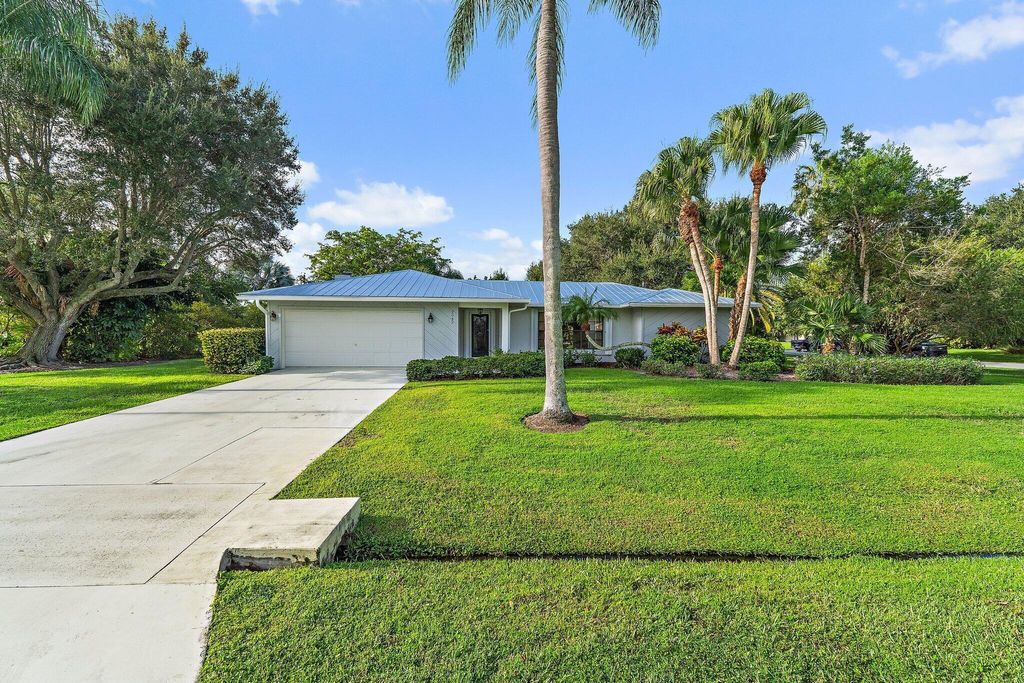 Photo of 2042 SE Pyramid Road, Port Saint Lucie, FL 34952 (MLS # R11129303)
