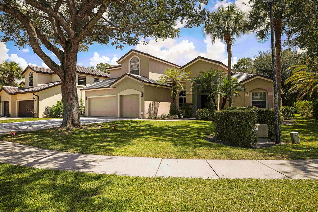 Photo of 15369 Whispering Willow Drive, Wellington, FL 33414 (MLS # B26068107)