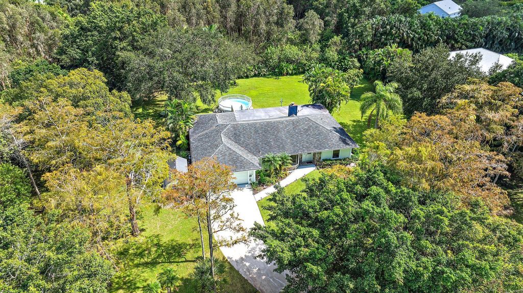 Photo of 15218 N 86th Way N, Palm Beach Gardens, FL 33418 (MLS # R11031196)