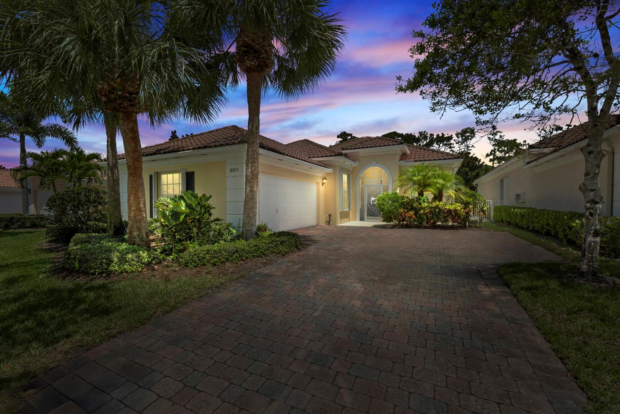 Welcome to Carleton Oaks - a private, gated Mediterranean‑style community offering the resort-style living experience with a clubhouse, community pool, lighted tennis and pickleball courts, playground, well-maintained walking trails surrounding the serene 12-acre lake. This original-pristine canvas features accordion shutters throughout, whole house generator for peace of mind, a separate sunroom with impact windows, fresh exterior paint, 2021 water heater, and NO polybutylene plumbing. The spacious CBS home offers 3 bedrooms with primary bedroom tuck away for privacy, and two original baths providing ample space to create your sanctuary. 8971 Oldham Way offers high vaulted 10‑ft plus ceilings, a den, 2 car air conditioned garage, fenced backyard with a view of lush preserve