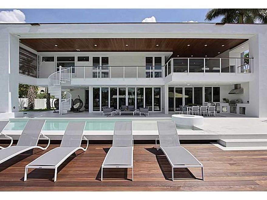 READY TO MOVE IN! LOCATED IN EXCLUSIVE LAS OLAS ISLES. CONTEMPORARY DEEP WATER ESTATE. LUXURY, QUALITY & DESIGN IS SHOWN THRU A TASTEFUL COMBINATION OF EXOTIC STONE, RARE WOODS & IMPACT GLASS. THE HOUSE OPENS COMPLETELY TO THE OUTSIDE FOR A TRUE SO FLA EXPERIENCE. OFFERED FULLY FURNISHED, INCLUDING A GOURMET CHEF'S KITCHEN, WALK-IN PANTRY, WET BAR, TWO STORY LIVING ROOM W/GLASS DOME CEILING, ELEVATOR, MEDIA ROOM, 2 LAUNDRY ROOMS, VIP GUEST SUITE, AMAZING MASTER A LRG LAP POOL. A PERFECT YACHTMAN'S DREAM!