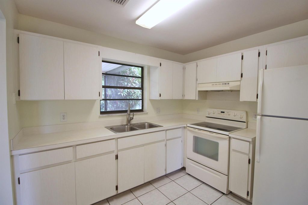 Photo of 957 SE Odonnell Lane, Port Saint Lucie, FL 34983 (MLS # R10917097)