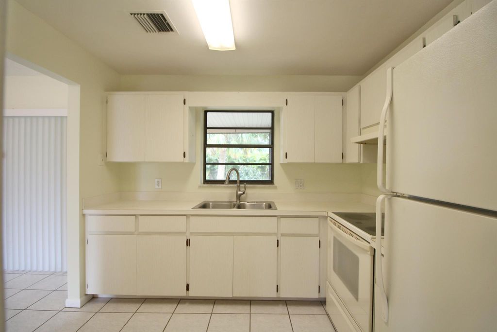 Photo of 957 SE Odonnell Lane, Port Saint Lucie, FL 34983 (MLS # R10917097)