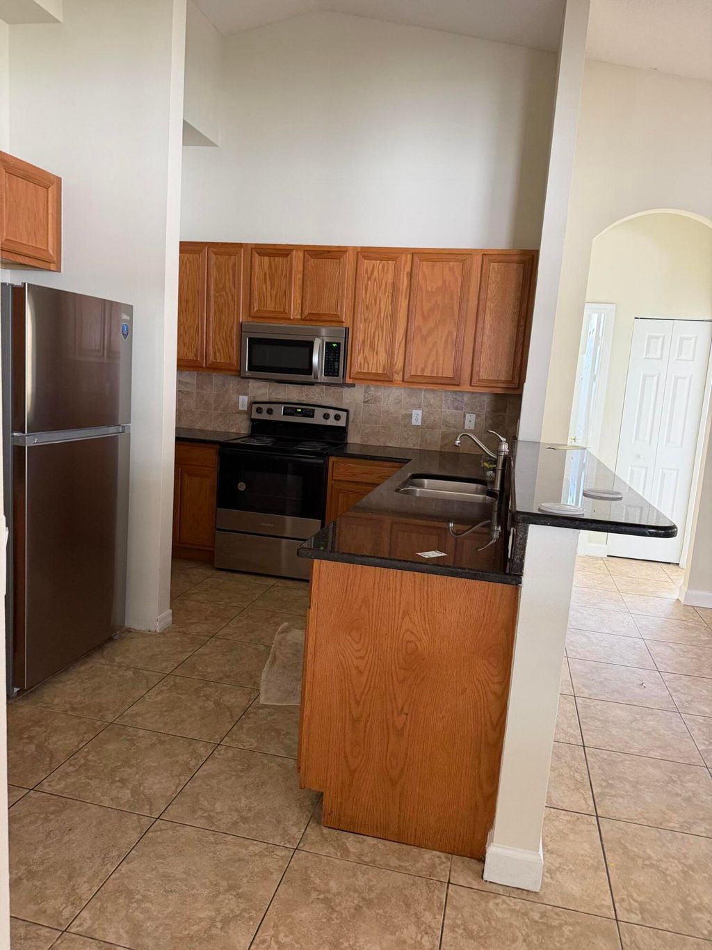 Photo of 787 SE Evergreen Terrace, Port Saint Lucie, FL 34983 (MLS # B26011499)