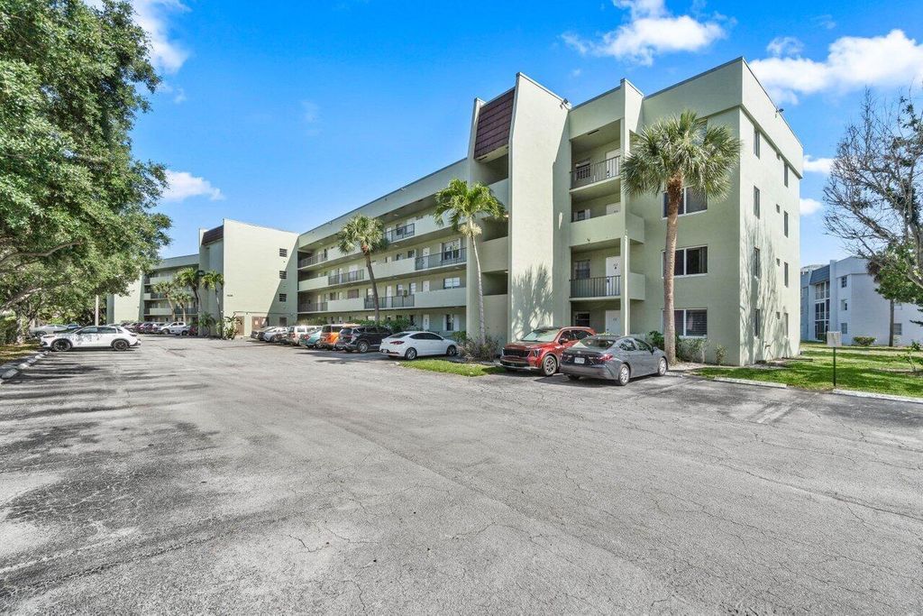Photo of 1638 Embassy Drive #411, West Palm Beach, FL 33401 (MLS # R11081573)
