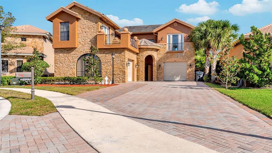 Beautiful estate home located on a cul-de-sac in the prestigious gated community of Versailles in Wellington, Florida. Step inside this elegant home through the grand entryway and be greeted by soaring volume ceilings, spacious living areas, tons of natural light and beautiful flooring throughout along with an inviting kitchen which boasts granite counters and backsplash as well as stainless steel appliances. All of the bedrooms are spacious as well and outside you can enjoy a lovely and very private backyard with no neighbors behind you. All of this located in an excellent school zone! Live the resort lifestyle in Versailles! This exclusive, gated community offers its residents many amenities including a wonderful clubhouse, pool, fitness center and much more! The low HOA fee includes landscaping, pest and weed maintenance, internet and cable! Located just minutes from of the International Polo Club, Florida's Turnpike, I-95, the Mall at Wellington Green and 3 international airports this gorgeous estate is truly a must see!