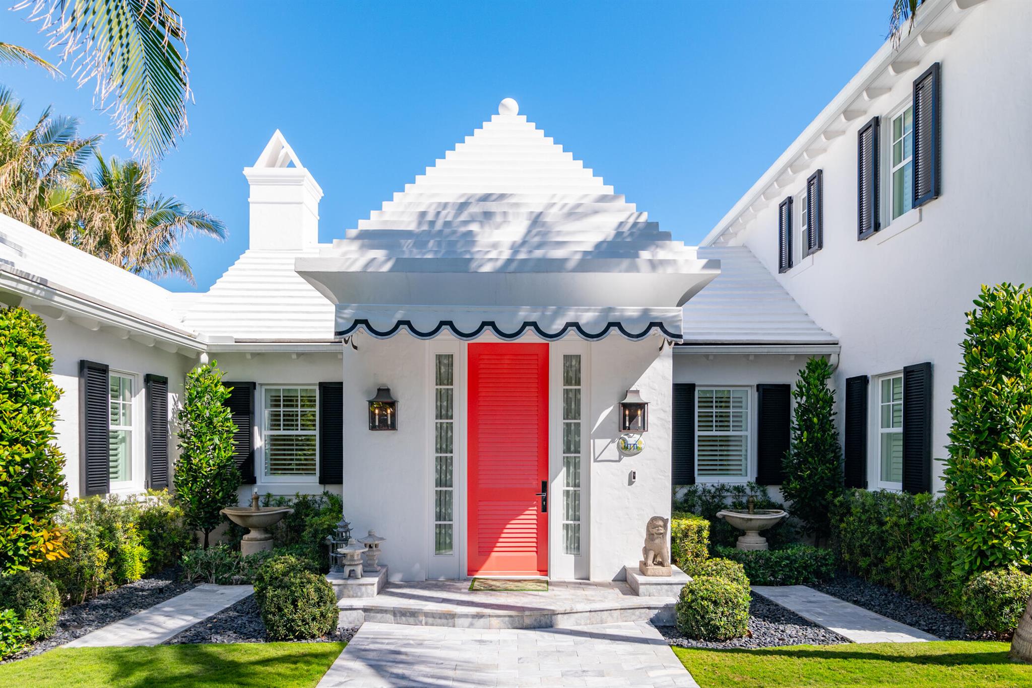 Welcome to your dream beach house. Nestled on one of Palm Beach's most coveted cabana streets on the island's North End. It is just steps from the ocean with private access to one of Florida's most beautiful surf beaches. Noted architects Smith and Moore designed this meticulously crafted, Bermuda-style residence which maximizes its prime location. It was built in 2015 by the sought-after Wittman Building Team. The house features Venetian plastered walls throughout and beautiful De Gournay and Scalamandre wallpapers. Upon arriving you enter an airy open concept living room with high vaulted ceilings. The room has been stylishly curated and is perfect for entertaining. The first level features an enviable, bright, large gourmet kitchen equipped with state-of-the-art