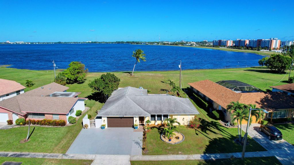 Photo of 1363 N Mangonia Drive, West Palm Beach, FL 33401 (MLS # R10948166)