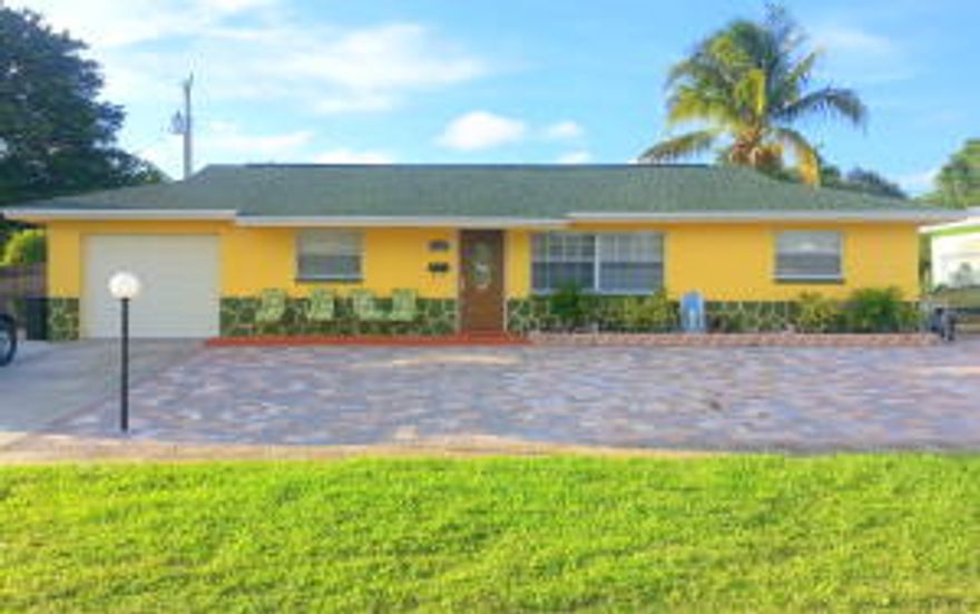 Beautiful 4 bedroom, 2 bath pool home located in the heart of Palm Beach Gardens. This home has been renovated featuring remodeled master bathroom, newer appliances, new wood flooring, new roof (2014,) new windows (2014), new driveway, new swimming pool (salt water treatment,) patio and more! The garage has been converted into a 4th bedroom with side door (separate access.) The large pool area and back yard are located next to a canal providing both quiet and a serene view. Call today to make a showing appointment.