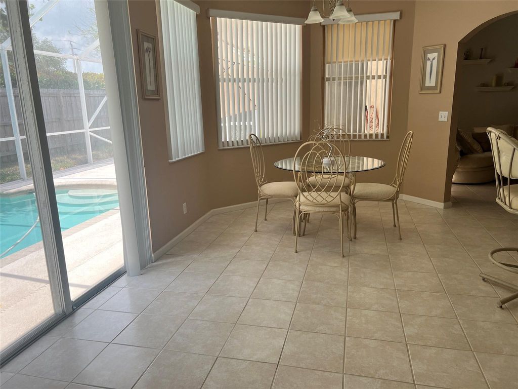 Photo of 6185 NW 45th Terrace, Coconut Creek, FL 33073 (MLS # F10441533)
