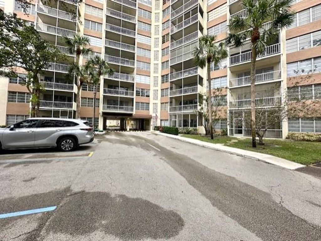 Photo of 10777 W Sample Road #103, Coral Springs, FL 33065 (MLS # F10552632)