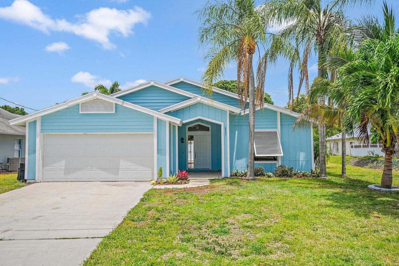Single Family Pool Home in Jupiter! This 3 Bedroom, 2 Bathroom, 2 Car Garage home located in the non HOA community of Jupiter Heights has a light, bright open floor plan, updated kitchen with stainless steel appliances and quartz countertops. New flooring throughout (no carpeting). Enjoy your backyard oasis with heated pool and TV on patio. This home is pet friendly and walking distance to the neighborhood park, Alton and downtown Abacoa. Zoned for A-Rated Schools and a quick ride to the beach.