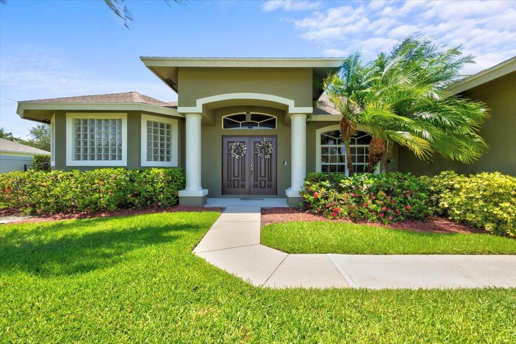 Photo of 6003 NW Winfield Drive, Port St Lucie, FL 34986 (MLS # R10898866)