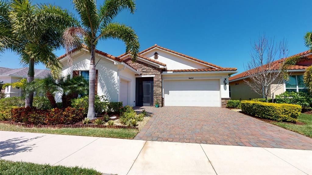Photo of 9604 SW Royal Poinciana Drive Dr, Port St Lucie, FL 34987 (MLS # R10701298)